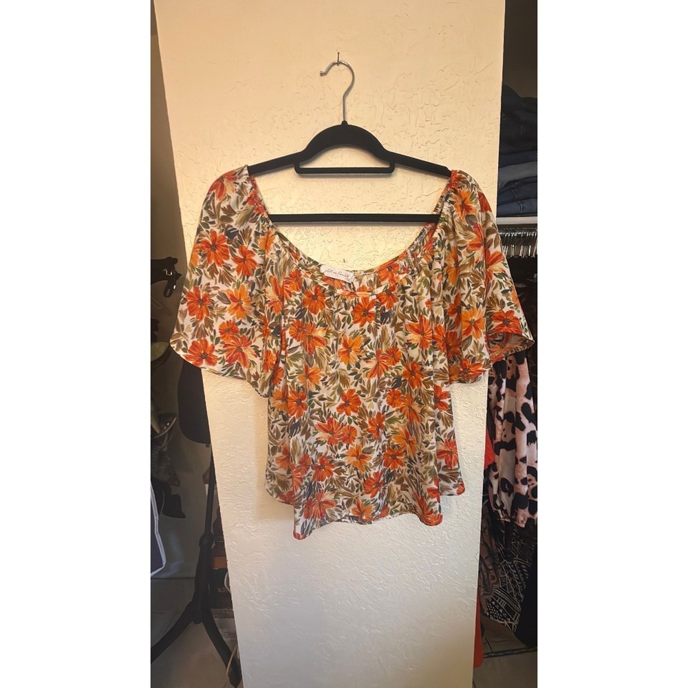 Orange flowered bell sleeved blouse hundred percent
